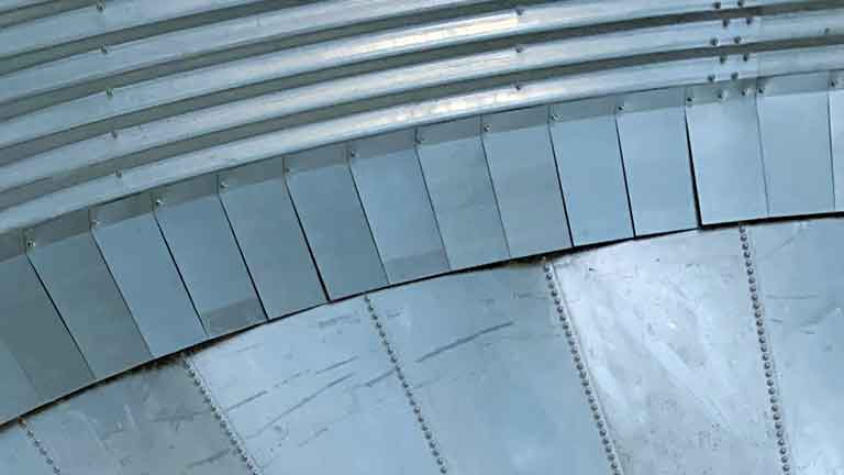 Flashing inside of an FCHT hopper tank